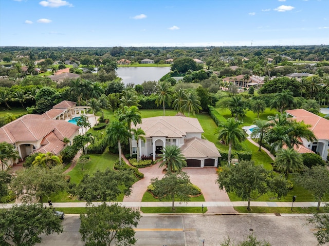 bird's eye view with a water view