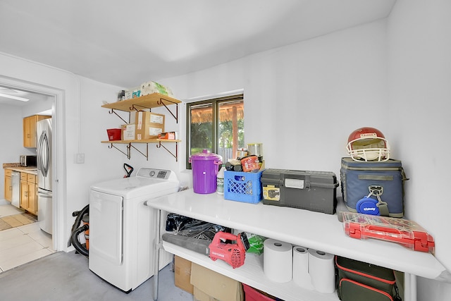 laundry room with washer / dryer