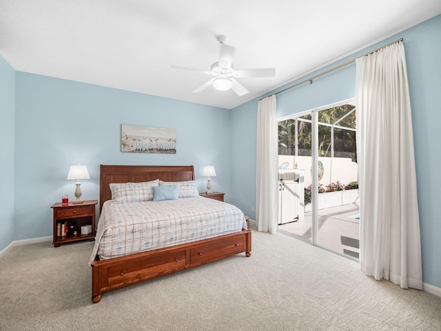 carpeted bedroom with ceiling fan and access to exterior