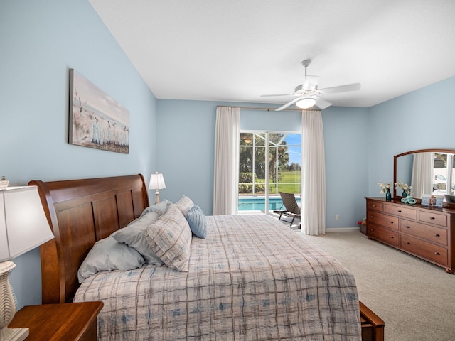 carpeted bedroom featuring multiple windows, ceiling fan, and access to exterior