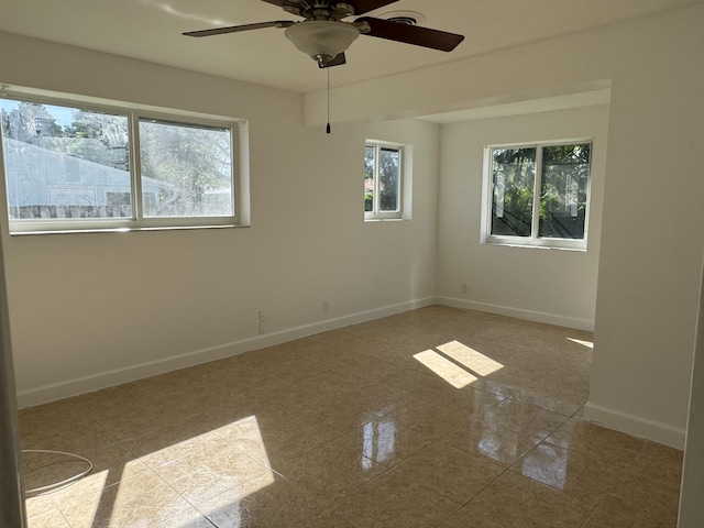 empty room featuring ceiling fan