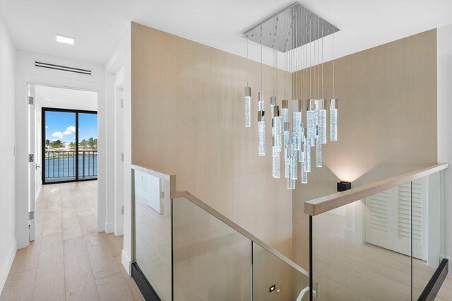 bathroom featuring vanity and tile walls