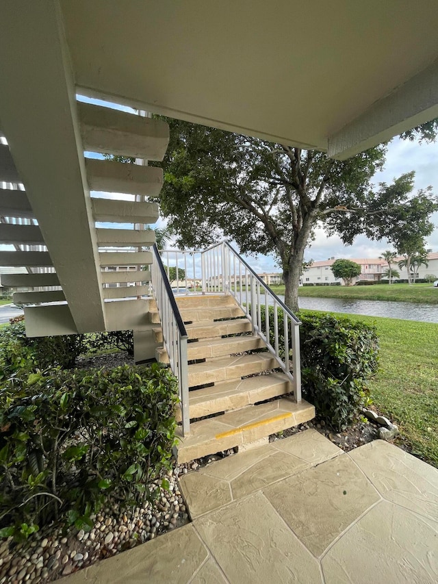 stairway with a water view