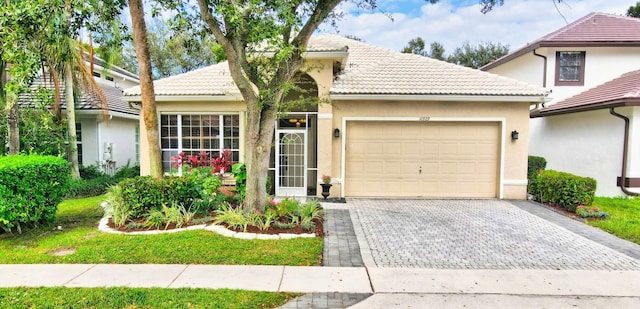 view of front of home with a garage