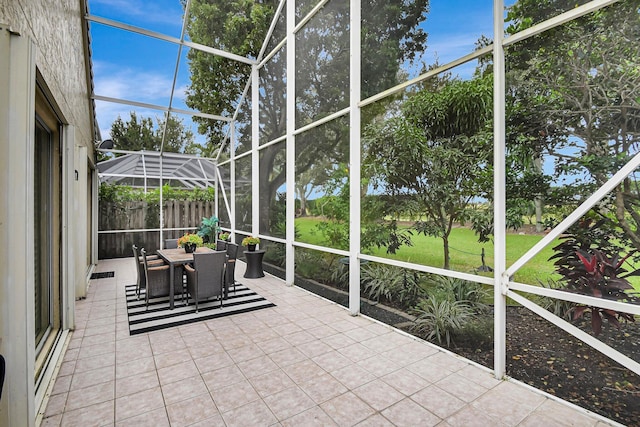 unfurnished sunroom with a wealth of natural light