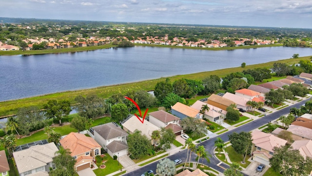 birds eye view of property featuring a water view