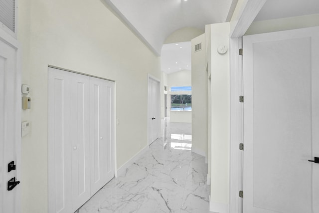 hallway with a high ceiling