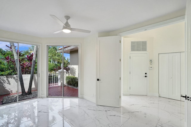 entryway with ceiling fan