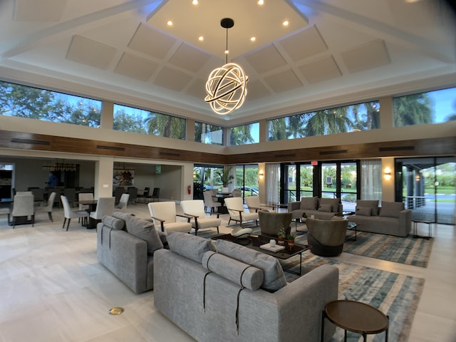 17264 Hampton Blvd, Boca Raton, FL 33496 - living area featuring a high ceiling, a chandelier, plenty of natural light, coffered ceiling, and recessed lighting