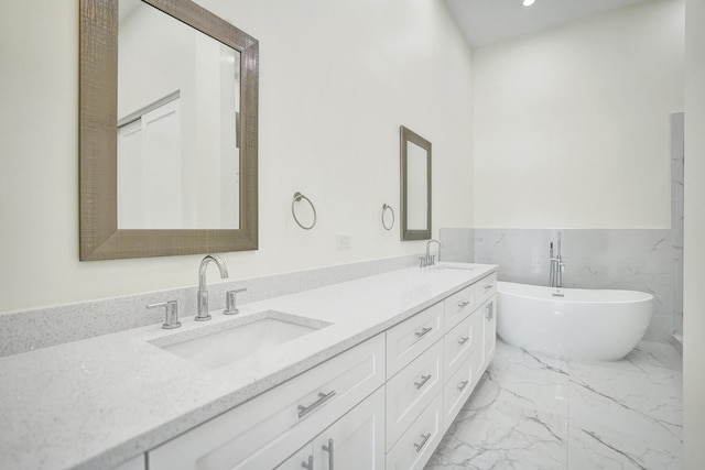 bathroom featuring a bathtub and vanity