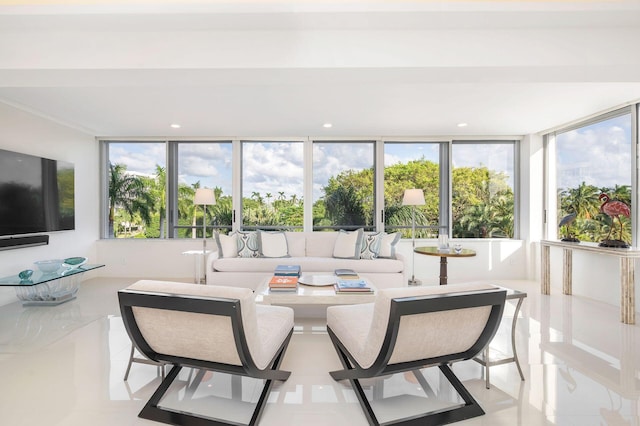 sunroom / solarium featuring a healthy amount of sunlight