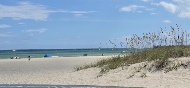 property view of water featuring a view of the beach