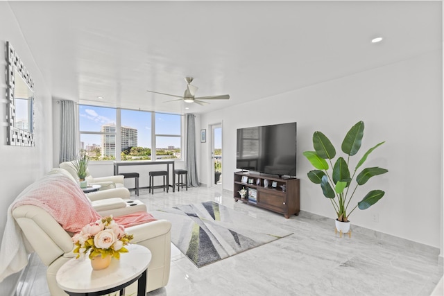 living room featuring ceiling fan