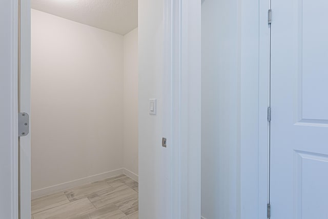 washroom with a textured ceiling