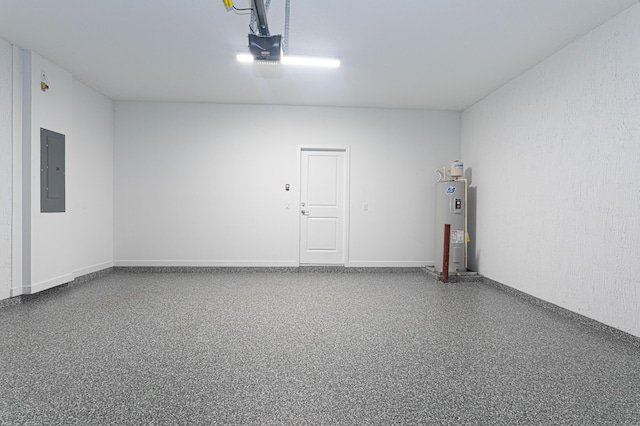 garage featuring electric water heater, electric panel, and a garage door opener