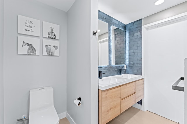 16570 Orange Blvd, Loxahatchee, FL 33470 - full bathroom featuring toilet and double vanity
