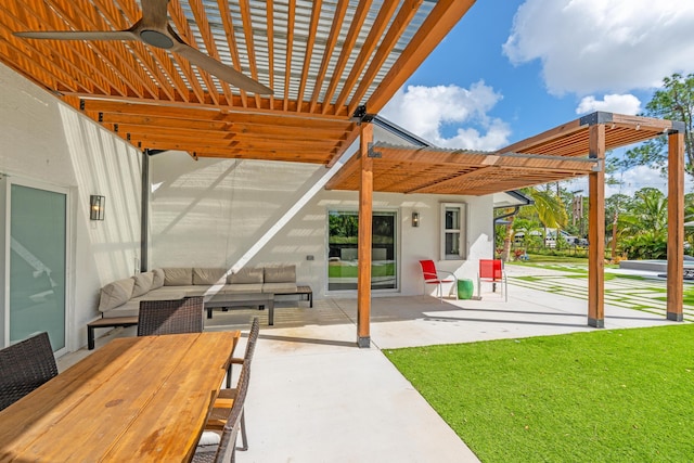 view of patio featuring ceiling fan and a pergola