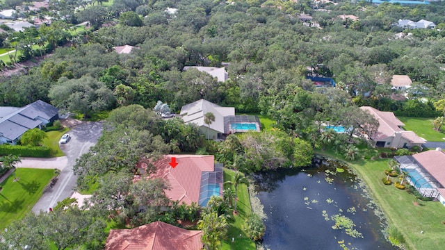 bird's eye view with a water view