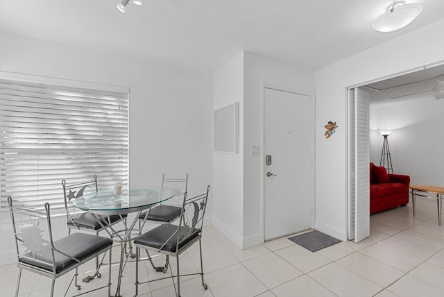 view of tiled dining space