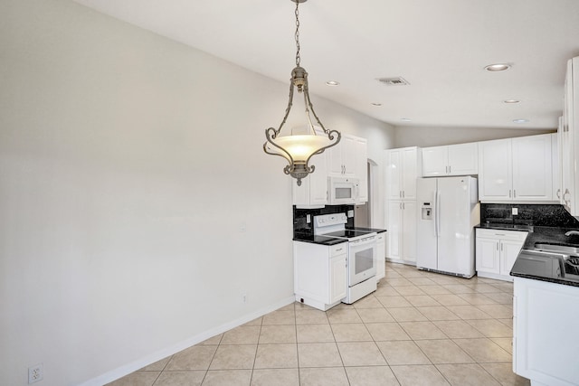 kitchen featuring lofted ceiling, hanging light fixtures, tasteful backsplash, white cabinetry, and white appliances