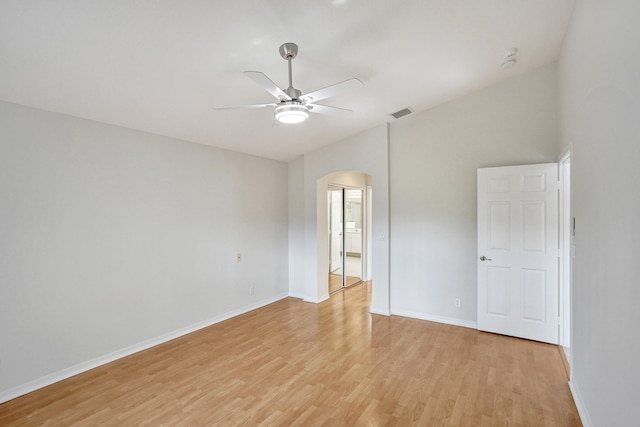 spare room with light hardwood / wood-style floors and ceiling fan