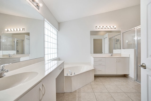 bathroom with vanity, tile patterned floors, shower with separate bathtub, and lofted ceiling