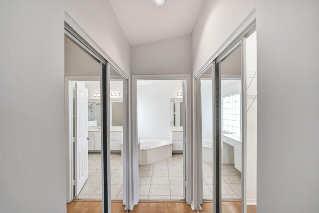 corridor featuring light wood-type flooring