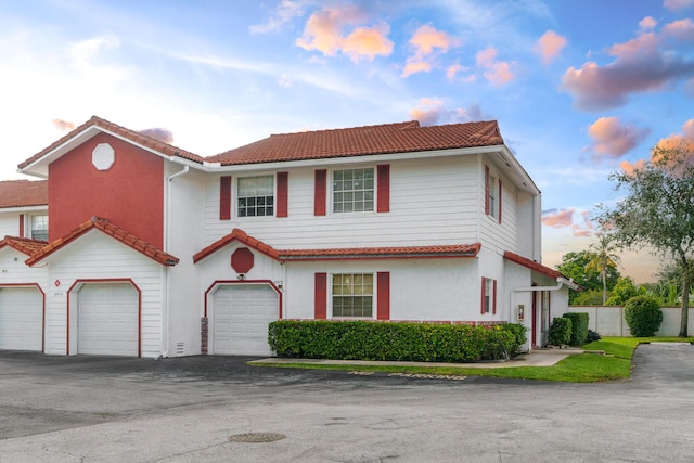 view of front of home with a garage