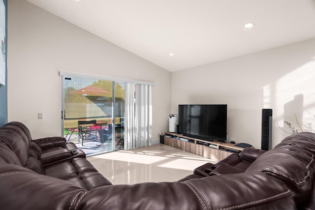 living room featuring vaulted ceiling