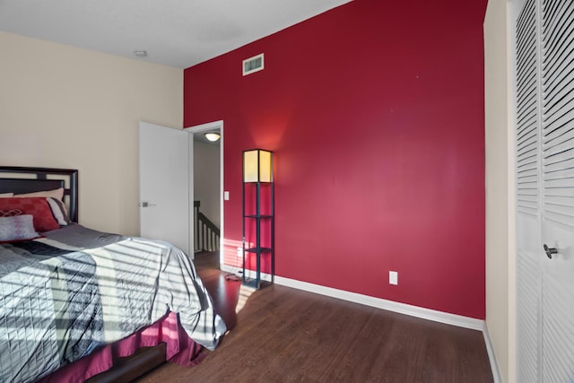 bedroom featuring wood-type flooring