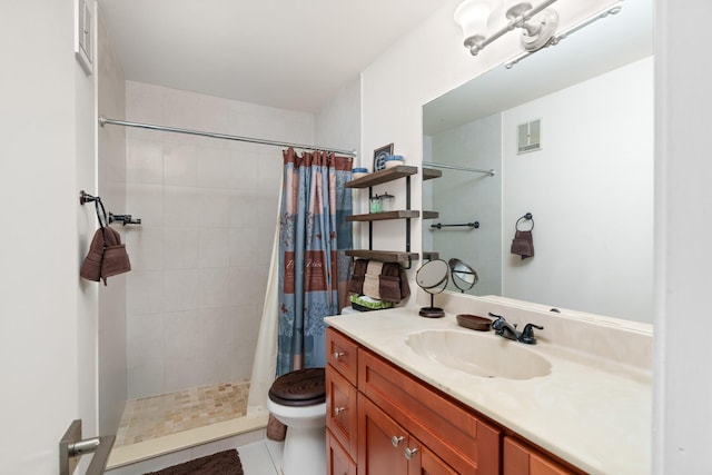 bathroom with tile patterned flooring, vanity, toilet, and walk in shower