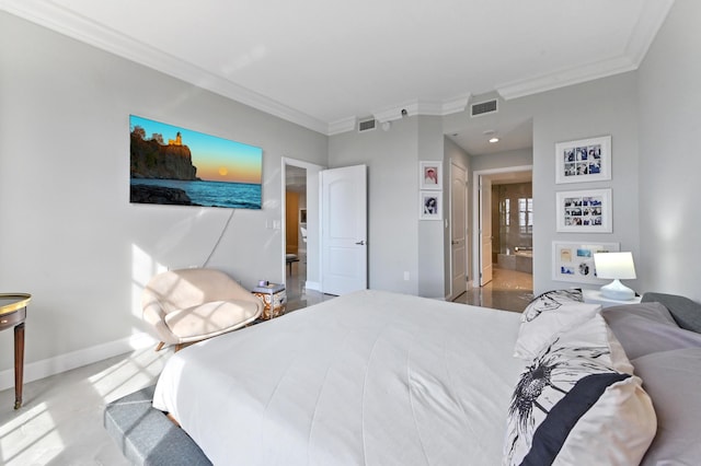 bedroom featuring ensuite bath and ornamental molding