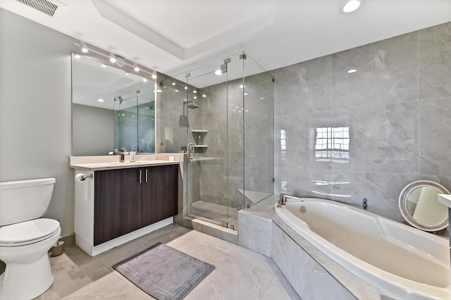 full bathroom featuring separate shower and tub, vanity, and toilet