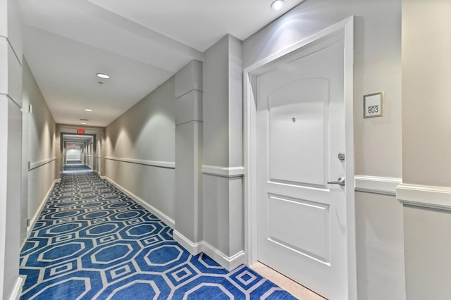 corridor with carpet floors