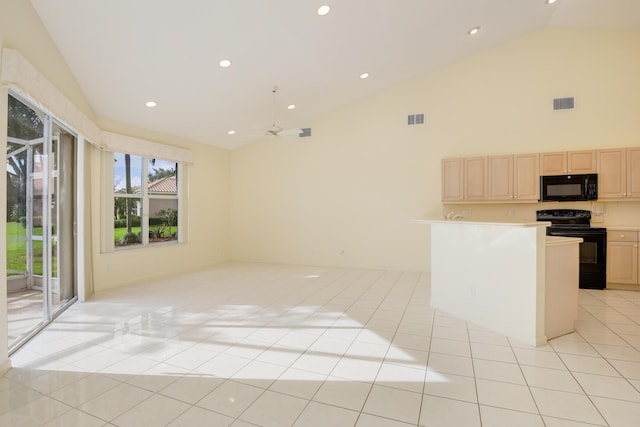 kitchen featuring light tile patterned floors, ceiling fan, light brown cabinetry, and black appliances