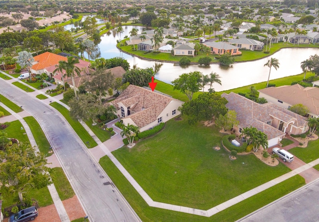 bird's eye view with a water view