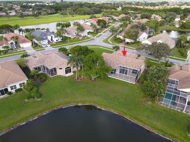 bird's eye view with a water view