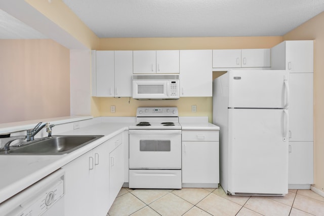 kitchen with white cabinetry, a textured ceiling, sink, and white appliances