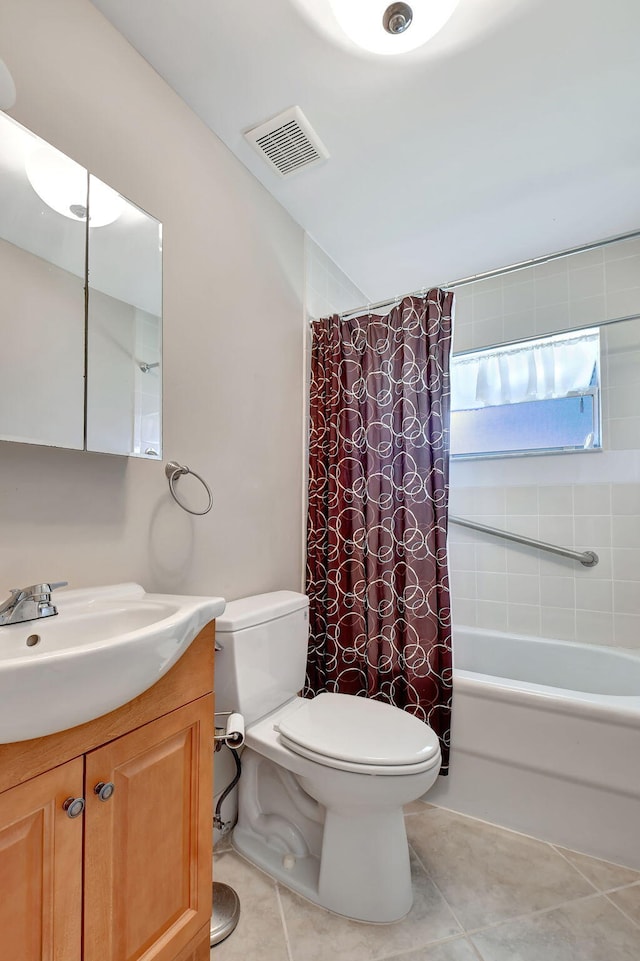 full bathroom with toilet, shower / tub combo, vanity, and tile patterned flooring