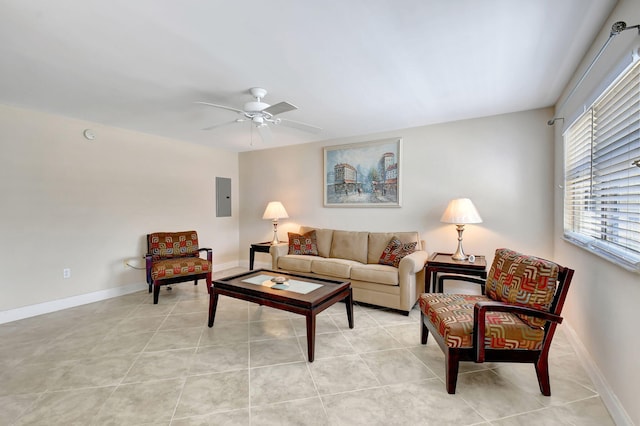 tiled living room featuring electric panel and ceiling fan