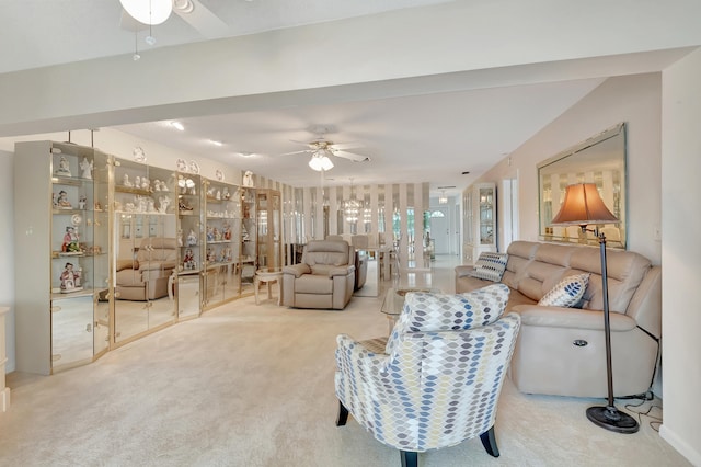 living room featuring ceiling fan and carpet floors