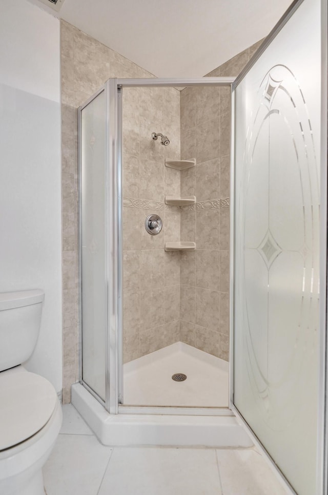 1260 NW 20th Ave Unit 203, Delray Beach, FL 33445 - full bath featuring toilet, a shower stall, and tile patterned floors