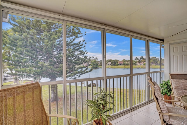 1260 NW 20th Ave Unit 203, Delray Beach, FL 33445 - sunroom / solarium featuring a water view