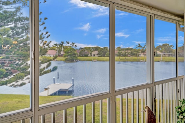 1260 NW 20th Ave Unit 203, Delray Beach, FL 33445 - unfurnished sunroom with a water view