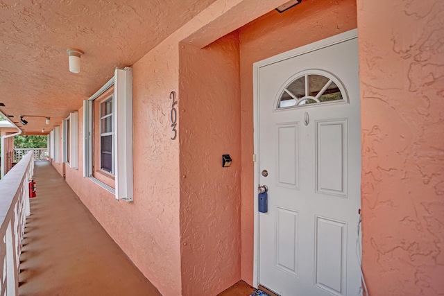 1260 NW 20th Ave Unit 203, Delray Beach, FL 33445 - entrance to property featuring stucco siding