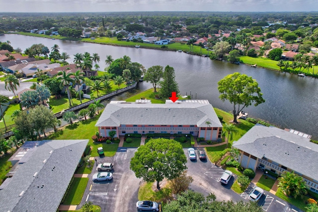 1260 NW 20th Ave Unit 203, Delray Beach, FL 33445 - drone / aerial view with a residential view and a water view