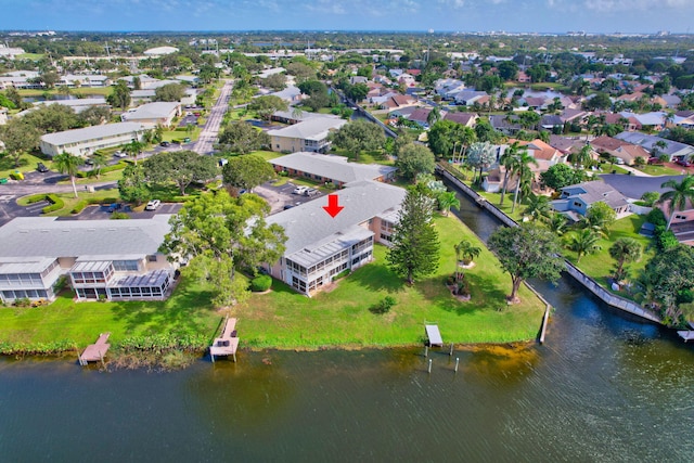 1260 NW 20th Ave Unit 203, Delray Beach, FL 33445 - drone / aerial view featuring a residential view and a water view