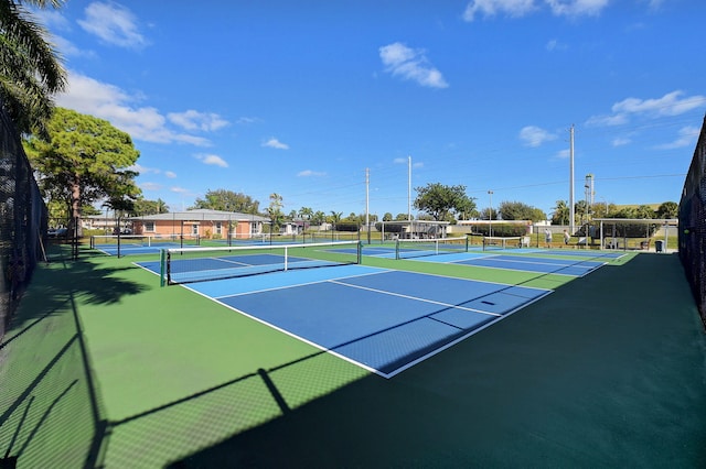 1260 NW 20th Ave Unit 203, Delray Beach, FL 33445 - view of tennis court with community basketball court and fence