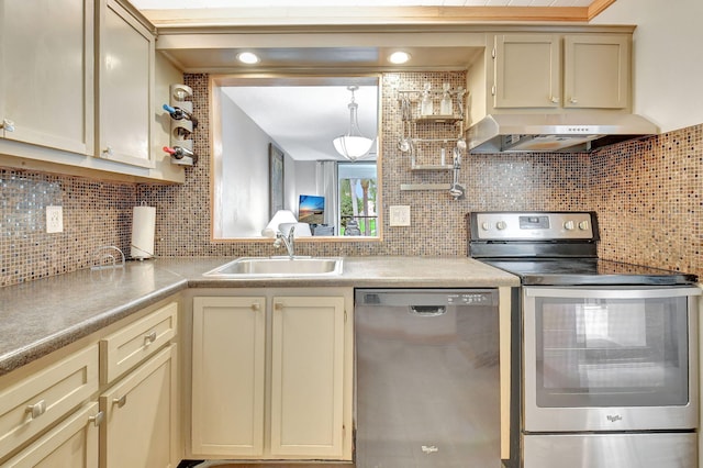 kitchen featuring exhaust hood, cream cabinets, sink, tasteful backsplash, and stainless steel appliances