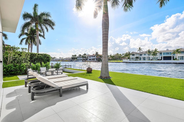 view of patio featuring a water view